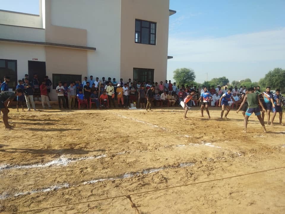 Community members participating in the sports programme